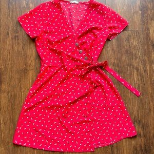 Red dress with waist tie and flower detail